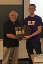 Undergraduate President Floris Van Rossum presents Award to Paul Exner '72